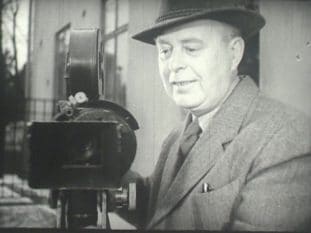 Fotografen Gustaf Boge med filmkamera.