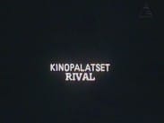 Texten "KINOPALATSET RIVAL" i vita bokstäver mot svart bakgrund.