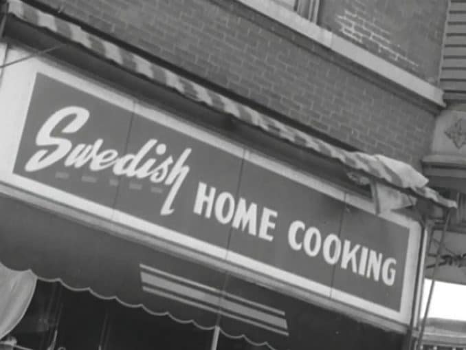 En restaurangskylt med texten "Swedish Home Cooking".
